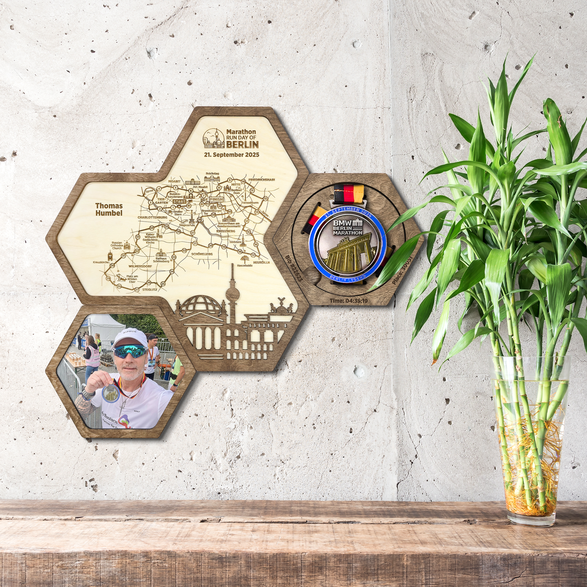 Modular wooden display holder for Berlin Marathon medal and route map with photo frame.
